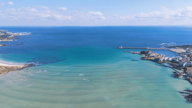 Serene coastal view with clear waters