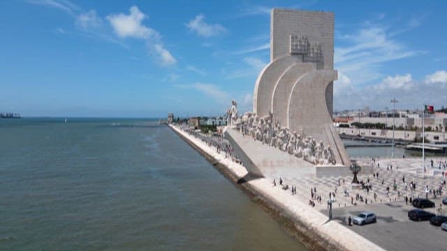 Tourists Gathering at a Riverside Padrao dos Descobrimentos in Lisbon