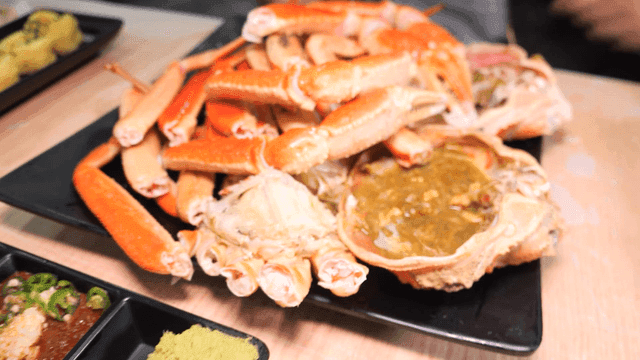 Sashimi and steamed snow crab full of meat