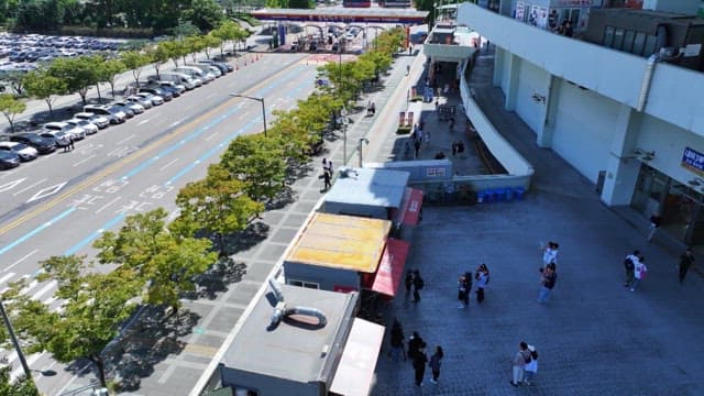 Around the urban stadium with visitors on a clear day