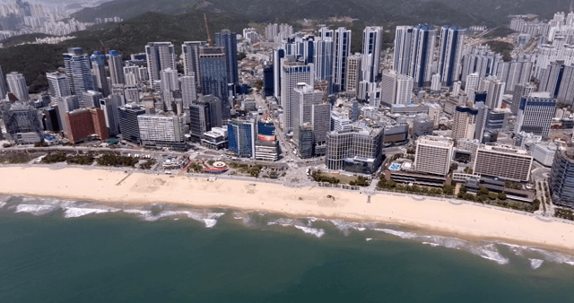 A bustling cityscape by the beach
