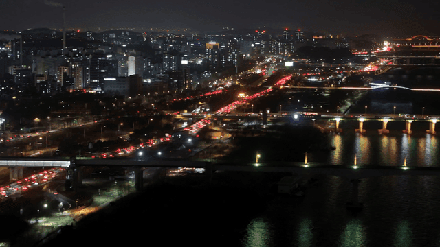 Night view of city with crowded roads