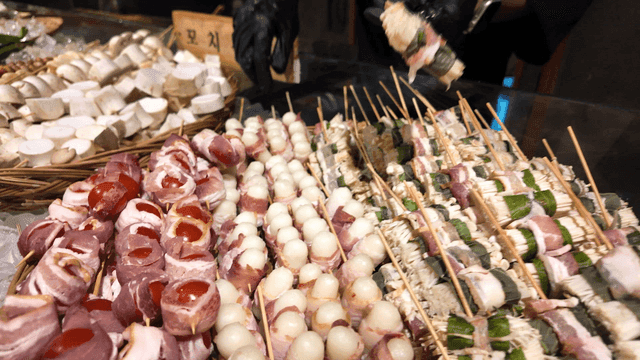 Various skewers displayed on ice