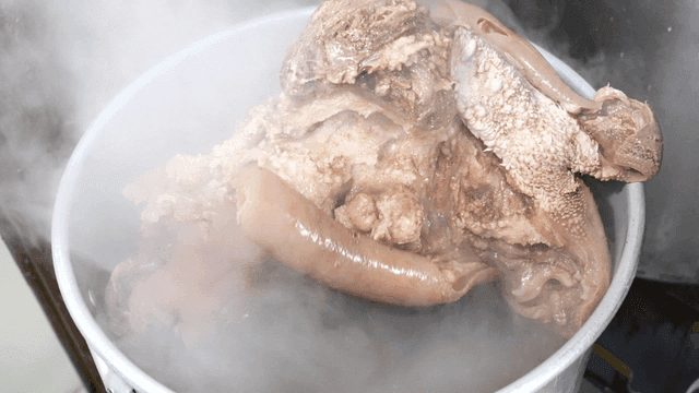 Beef stew taken out of large pot