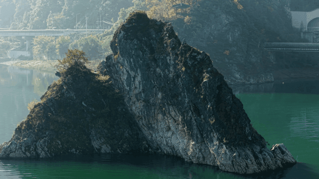 Rocky island in a serene river