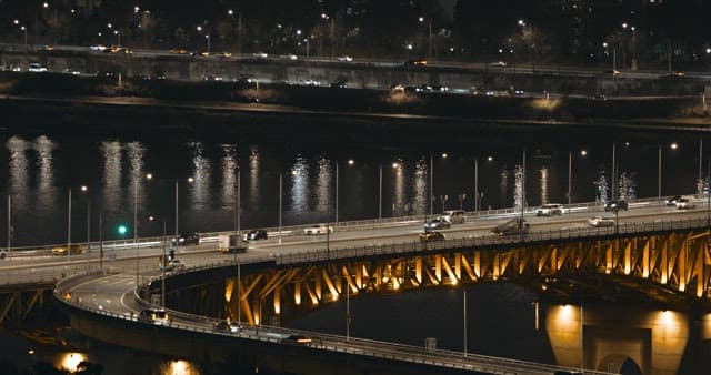 Evening Traffic Over Illuminated Bridge of Han River