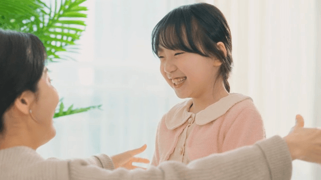 Mother and daughter sharing a joyful moment