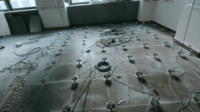 Empty floor under construction with cables