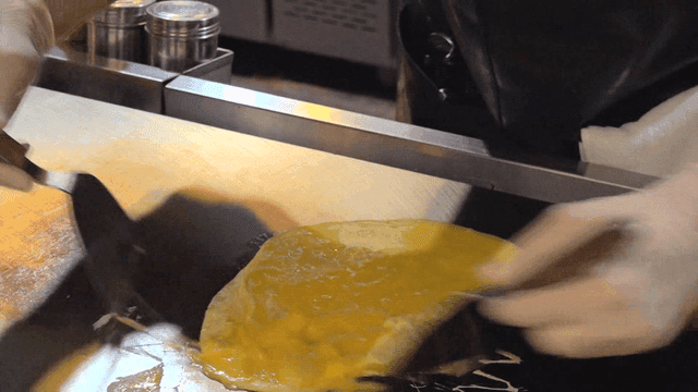 Cooking omelet on hot griddle