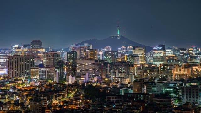 Night view of a bustling city skyline