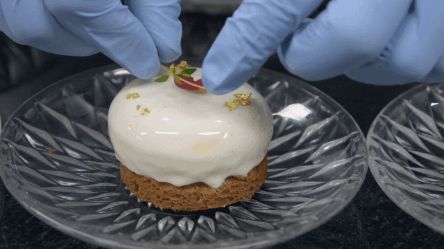 Pastry chef decorating desserts