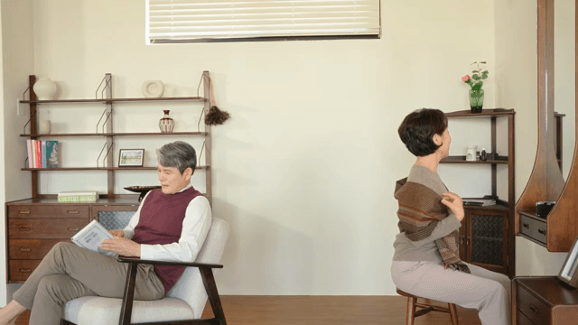 Elderly couple relaxing in a cozy living room