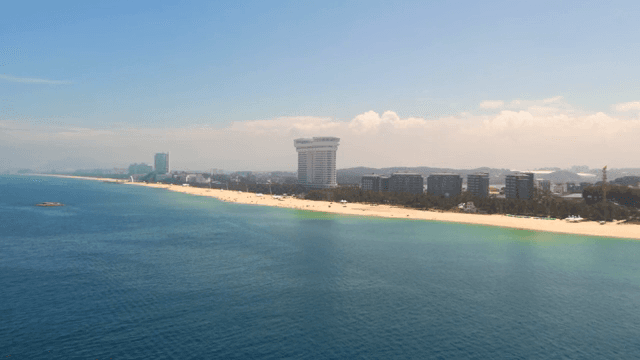 Beautiful beach with modern buildings