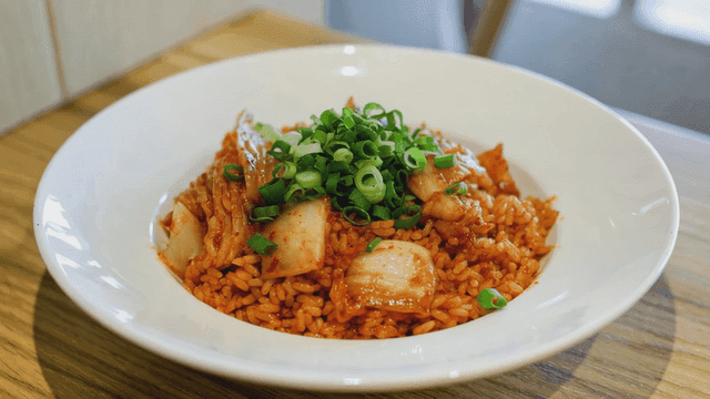 Kimchi fried rice garnished with green onions