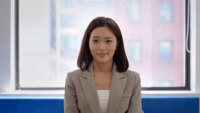 Smiling woman in suit