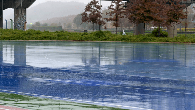 Rain falling on an empty outdoor track