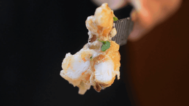 Shrimp tempura cut with scissors
