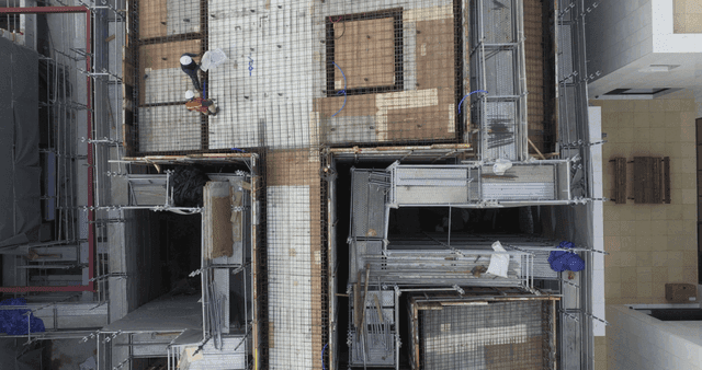 Construction site with scaffolding and workers