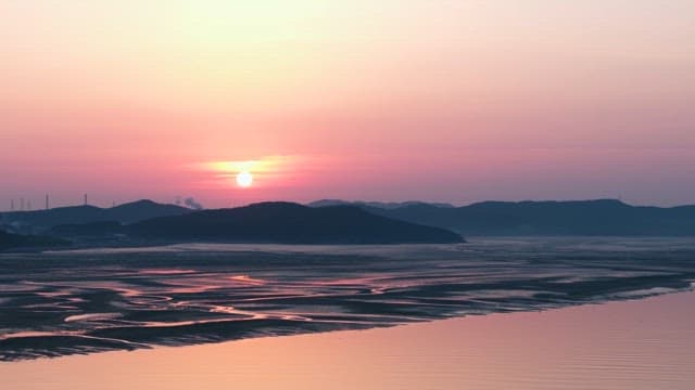 Serene Sunset Over Coastal Wetlands