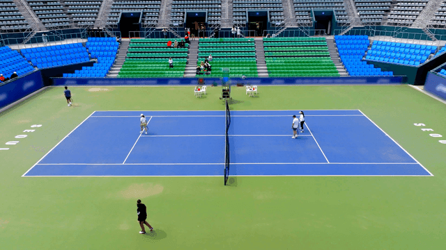 Tennis match in a large stadium