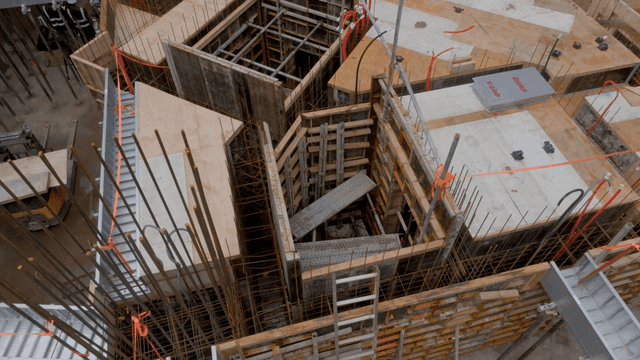 Construction site with scaffolding and beams