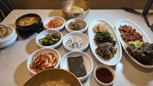 Variety of Korean side dishes on a table