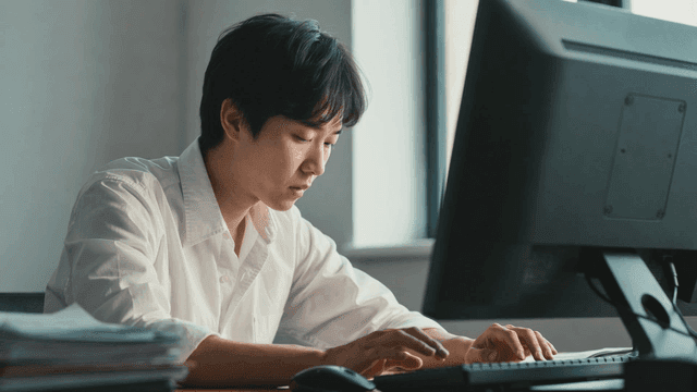 Man working at a desk in an office