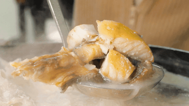 Ladle for scooping out boiling fish soup from pot