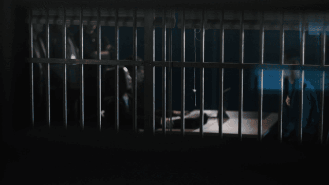 A meeting in a dimly lit room