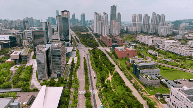 Modern cityscape with green spaces