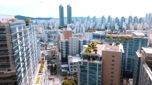 Bustling city with tall skyscrapers.