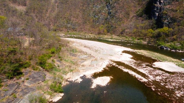 Serene river flowing through a valley