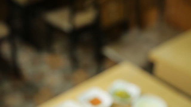 Korean meal with stir-fried squid and pork, rice, and soybean paste stew