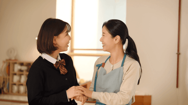 Mother and daughter laughing and having fun together