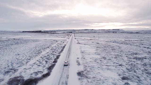 Car driving on a snowy road
