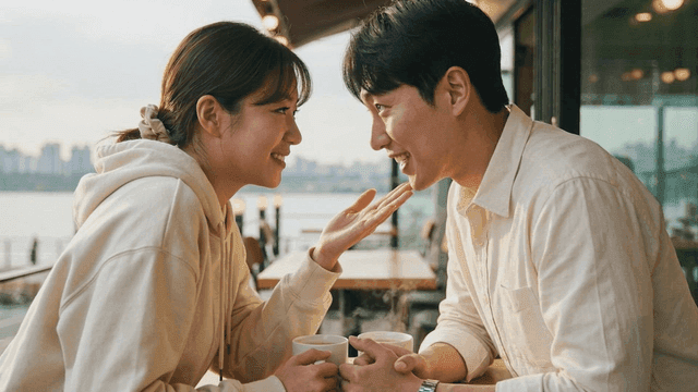 Warm coffee and sweet couple at riverside cafe