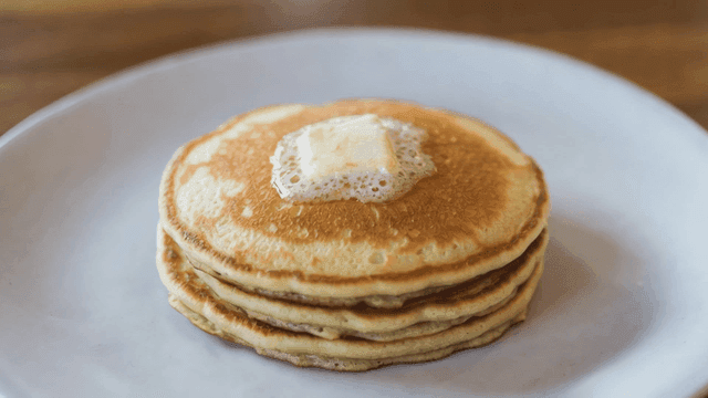 Pancakes topped with melted butter