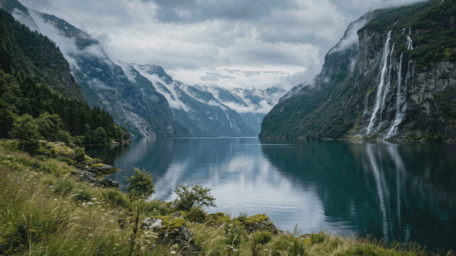 Tranquil lake surrounded by mountains