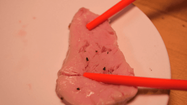 Piece of sous vide sirloin that can be torn apart with chopsticks