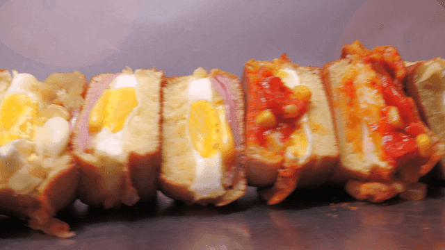 Various Korean egg bread on a tray