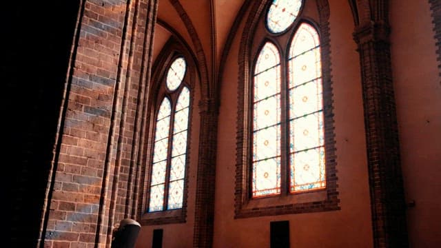 Beautiful stained glass windows in a historic cathedral under natural light