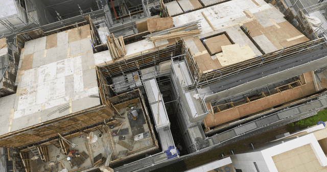 Construction site with scaffolding and workers