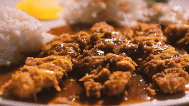 Western-style meal with sauce and pork cutlet