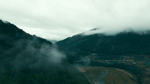 Misty mountains and green valleys