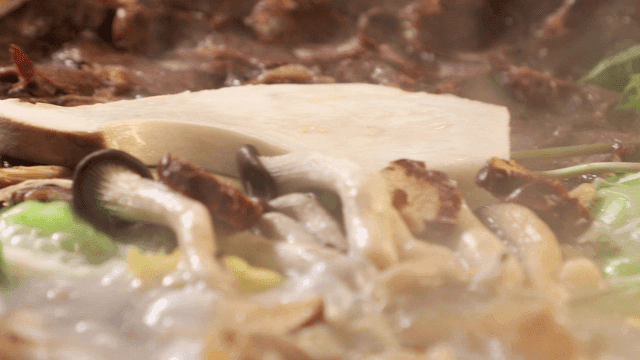 Richly simmering mushroom and Hanwoo beef hot pot