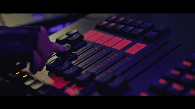 Adjusting audio mixer controls in studio