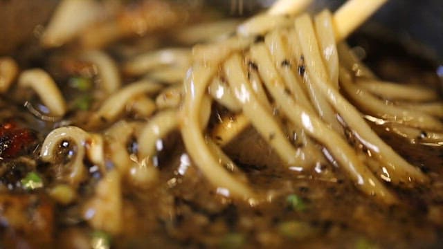 Noodles Lifted with Chopsticks