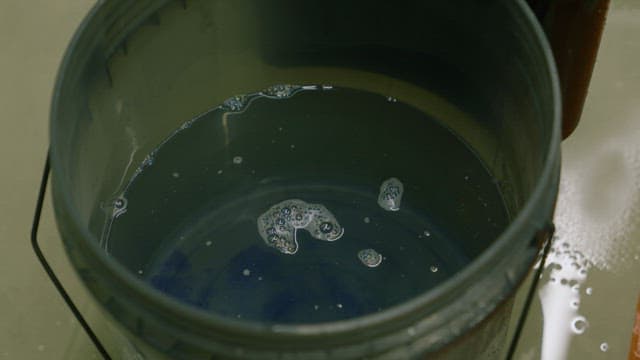 Foam Made by Stirring Soapy Water in a Bucket