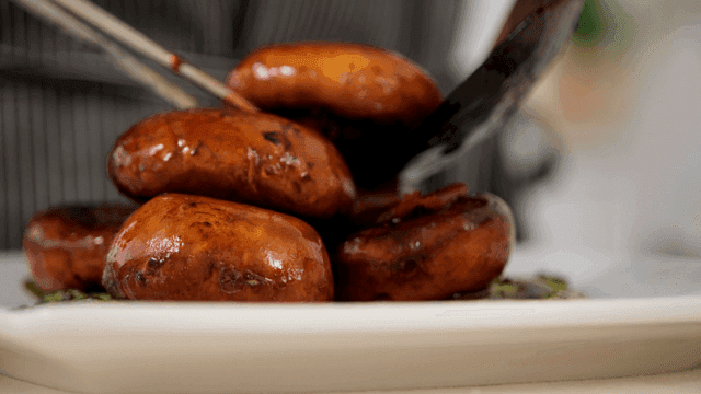Baked mushrooms piled on plate