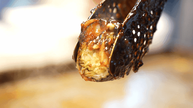 Pork belly rolls topped with glossy sauce